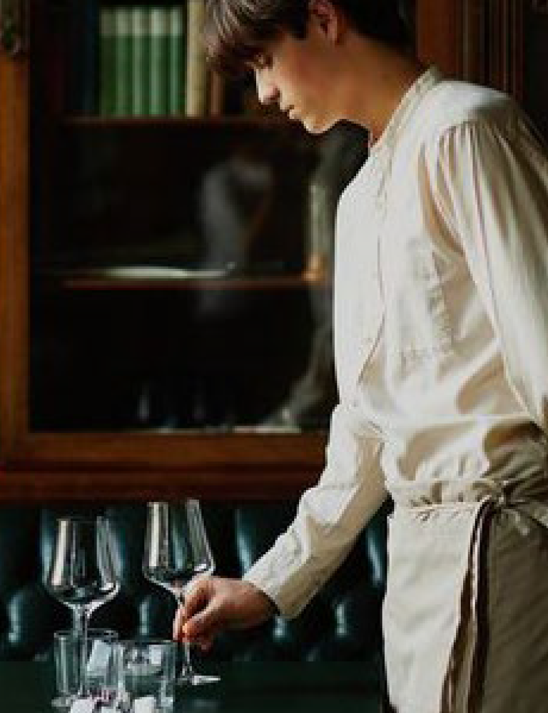 Waiter setting table